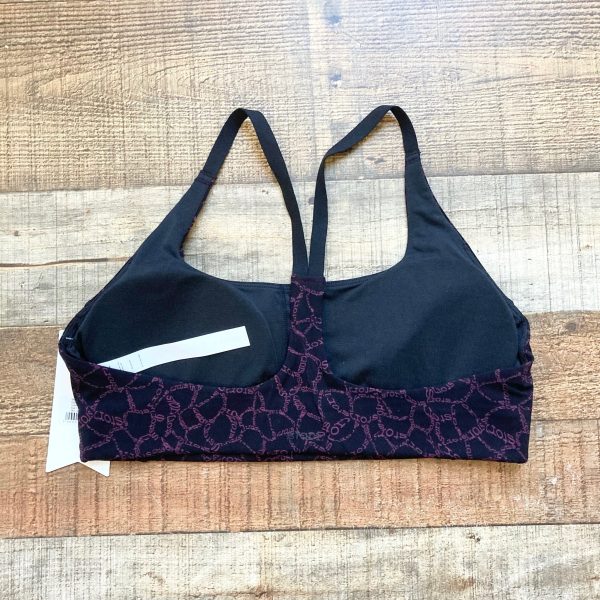 Stori Black with Purple Logo Pattern Icon Low Support Padded Sports Bra NWT- Size 10 For Cheap