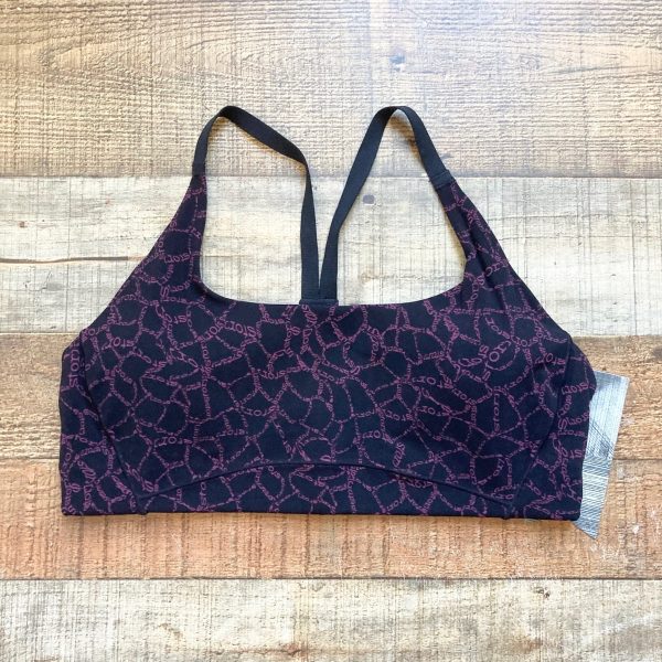 Stori Black with Purple Logo Pattern Icon Low Support Padded Sports Bra NWT- Size 10 For Cheap