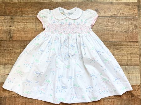 Beaufort Bonnet Company White with Pink Blue Green Flowers and Bows Print and Back Bow Smocked Dress- Size 5 For Sale